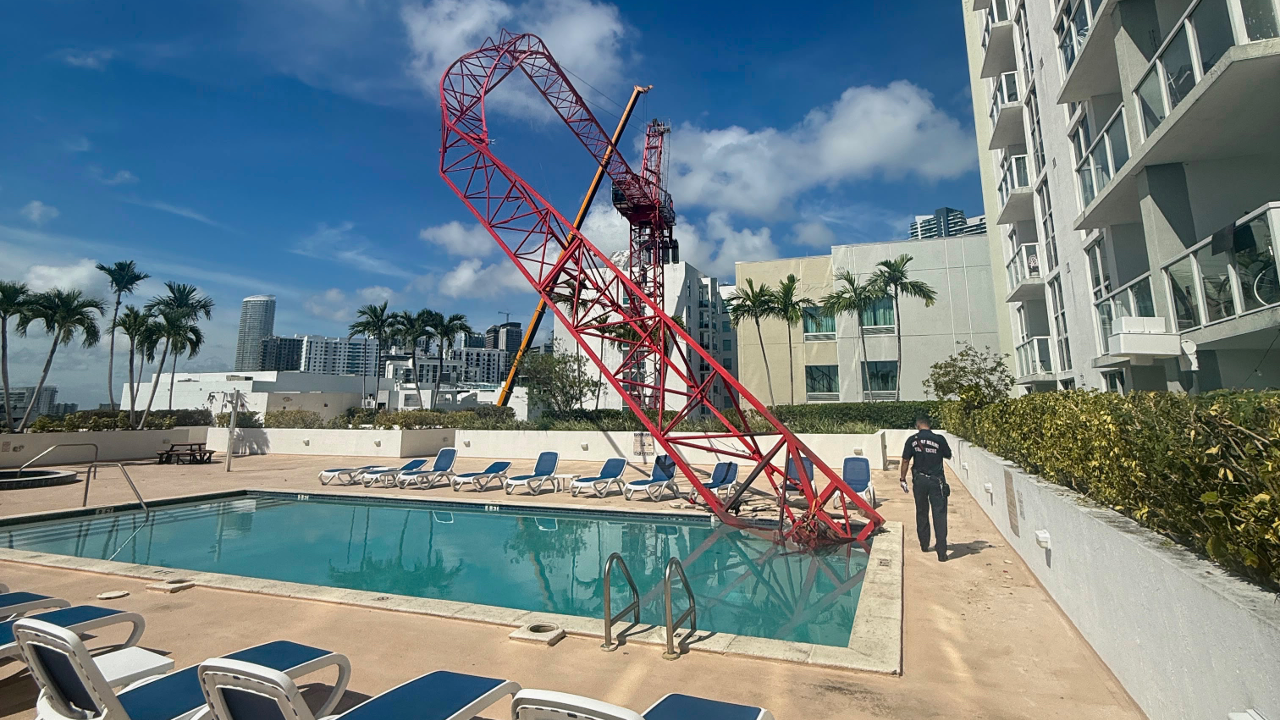 Miami crane collapse drops arm onto luxury condo pool, no injuries Miami crane collapse drops arm onto luxury condo pool, no injuries
