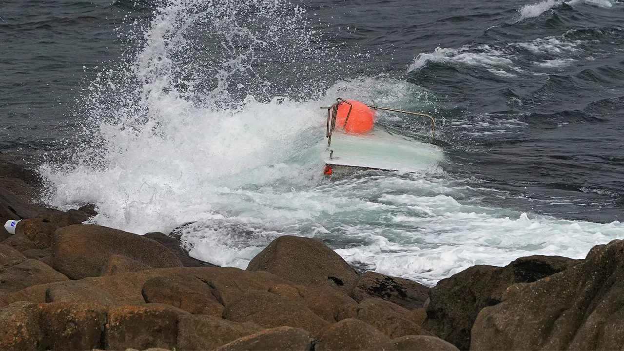 Teen boater found clinging to capsized vessel after 3 go missing; 2 bodies recovered