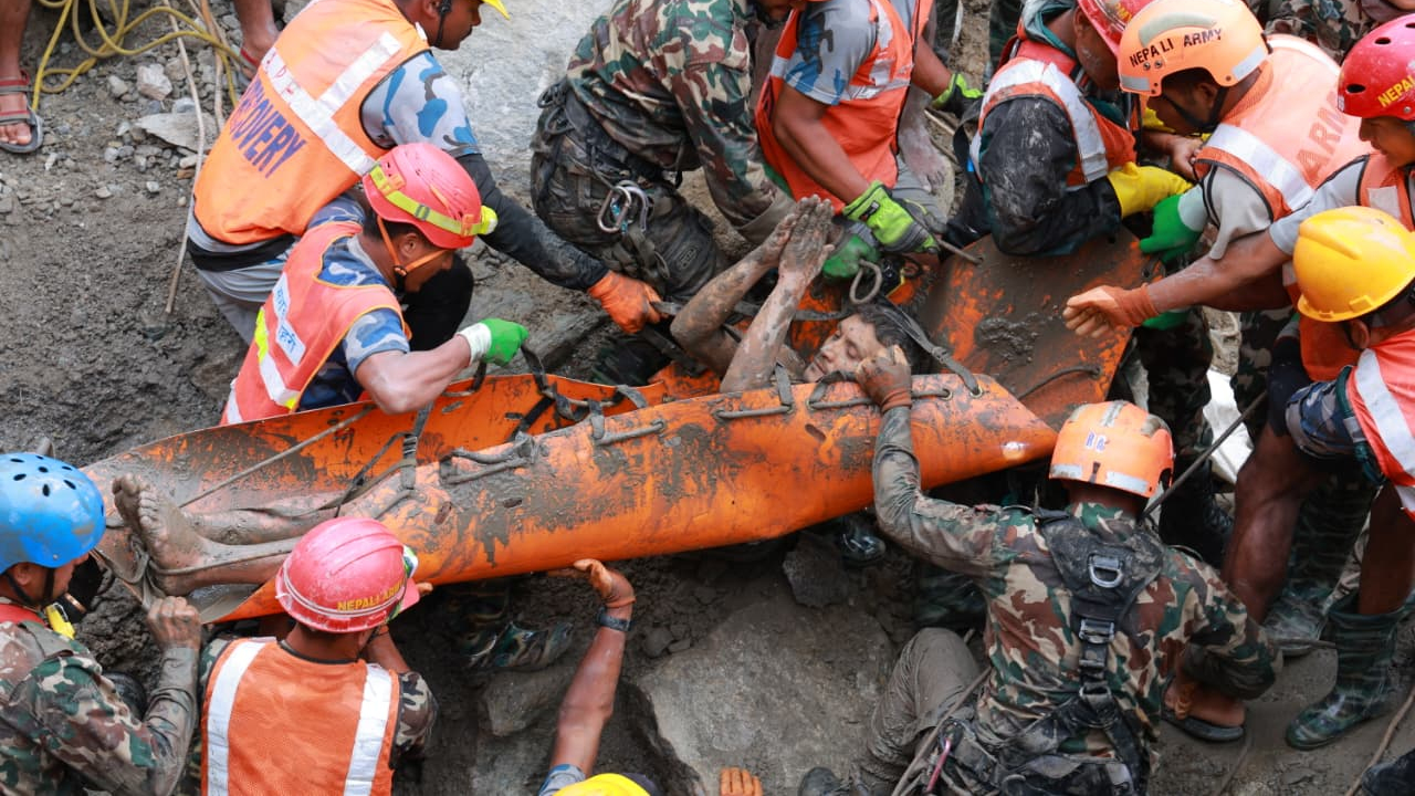 Trapped Nepal workers pulled alive from tunnel 9 days after deadly flooding, raising hope for more rescues Trapped Nepal workers pulled alive from tunnel 9 days after deadly flooding, raising hope for more rescues