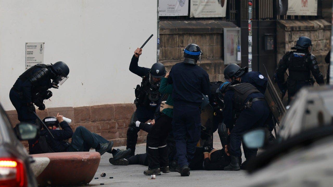 France protests: 135 arrested as police deploy across the country